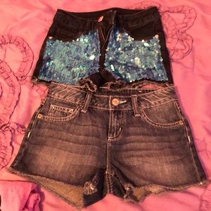 Two pairs of girls Justice shorts